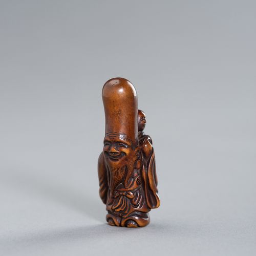 A WOOD NETSUKE OF FUKUROKUJU AND KARAKO NETSUKE IN LEGNO DI FUKUROKUJU E KARAKOG&hellip;