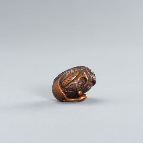 SADANOBU: A FINE WOOD NETSUKE OF A DRAGON INSIDE MIKAN SADANOBU: NETSUKE DE MADE&hellip;