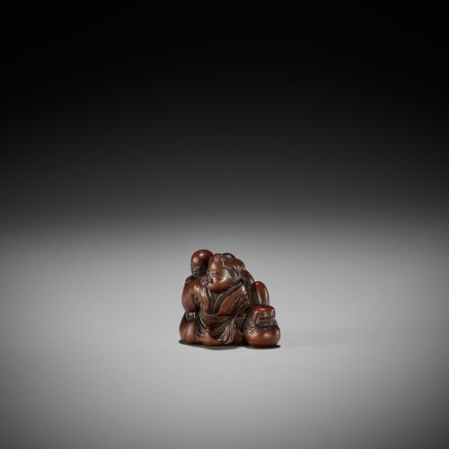 MASATOSHI: A FINE WOOD SHUNGA NETSUKE OF A WOMAN WITH TENGU MASK MASATOSHI: UN F&hellip;