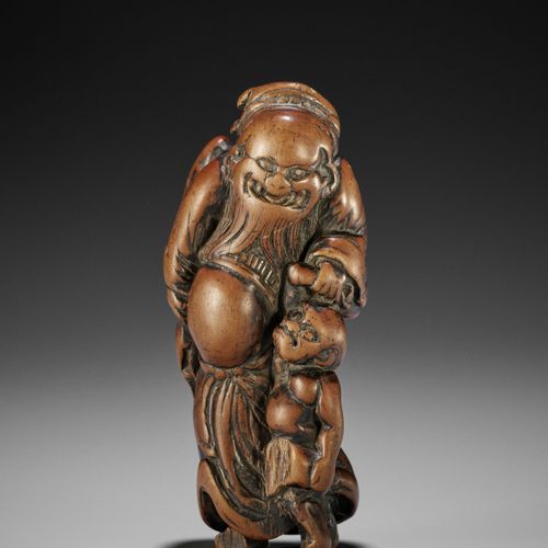 A LARGE WOOD NETSUKE OF SHOKI AND ONI 大型木制镇魂兽
无署名
 日本，可能是大阪，18世纪，江户时代（1615-1868）&hellip;