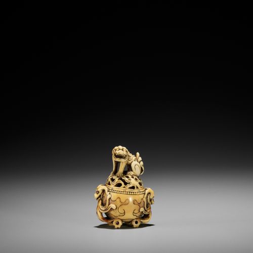 A RARE IVORY NETSUKE OF A KORO (INCENSE BURNER) WITH SHISHI A RARE IVORY NETSUKE&hellip;