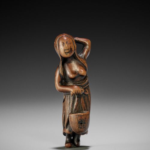 AN OLD WOOD NETSUKE OF A DIVING GIRL (AMA) 潜水女孩的旧木制网书（AMA）
无署名
日本，18世纪，江户时代（1615&hellip;