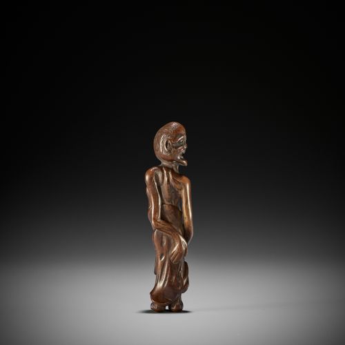 A RARE TALL WOOD NETSUKE OF TENAGA UN RARE NETSUKE EN BOIS DE TENAGA
Non signé
J&hellip;