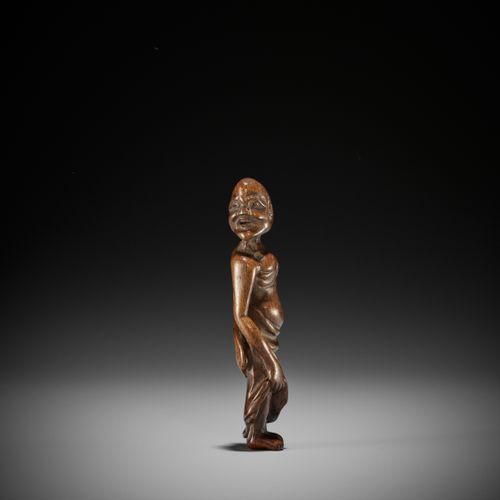 A RARE TALL WOOD NETSUKE OF TENAGA A RARE TALL WOOD NETSUKE OF TENAGA
Unsigned
J&hellip;