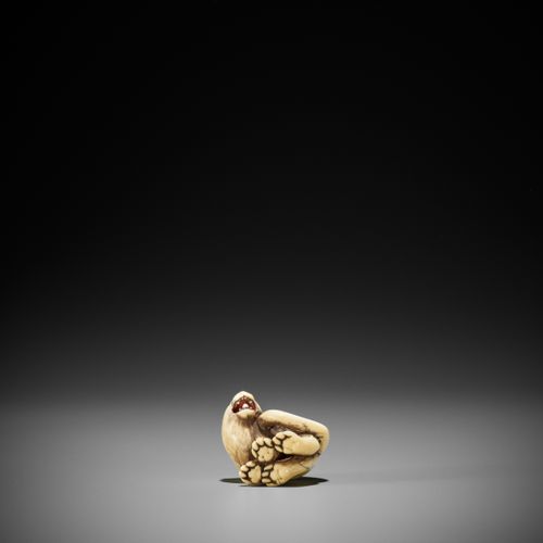 OTOMAN: A SUPERB IVORY NETSUKE OF A TIGER OTOMAN: A SUPERB IVORY NETSUKE OF A TI&hellip;