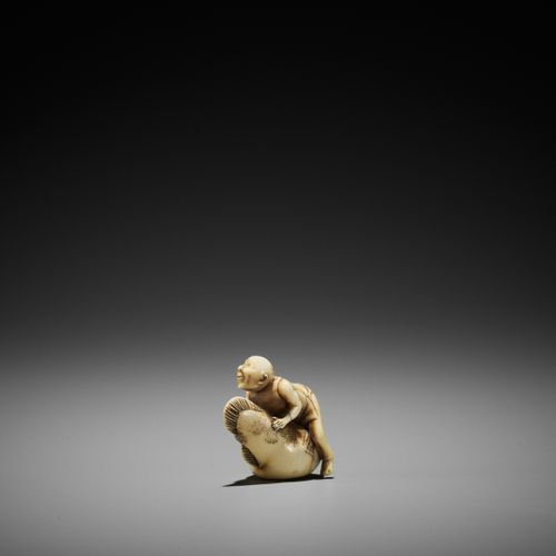 A RARE IVORY NETSUKE OF A FISHERMAN ON A FUGU RARE NETSUKE EN IVOIRE D'UN PECHEU&hellip;