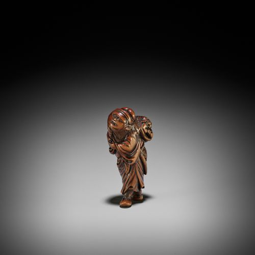 A SUPERB WOOD NETSUKE OF SHOKI WITH ONI 一件极好的木雕SHOKI与ONI
以辻氏的方式，未署名
日本，大阪，约1800年&hellip;