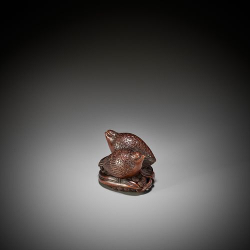 OKATOMO: A RARE STAINED WOOD NETSUKE OF TWO QUAILS ON MILLET 冈友：罕见的青花木网书：两只鹌鹑在小米&hellip;