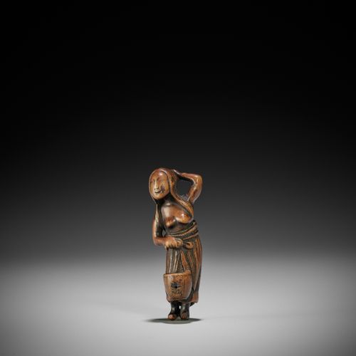 AN OLD WOOD NETSUKE OF A DIVING GIRL (AMA) 潜水女孩的旧木制网书（AMA）
无署名
日本，18世纪，江户时代（1615&hellip;