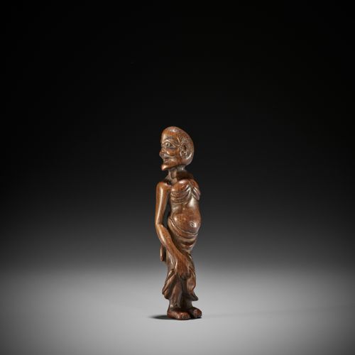 A RARE TALL WOOD NETSUKE OF TENAGA A RARE TALL WOOD NETSUKE OF TENAGA
Non firmat&hellip;