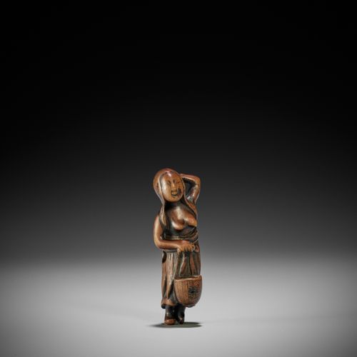 AN OLD WOOD NETSUKE OF A DIVING GIRL (AMA) AN OLD WOOD NETSUKE OF A DIVING GIRL &hellip;