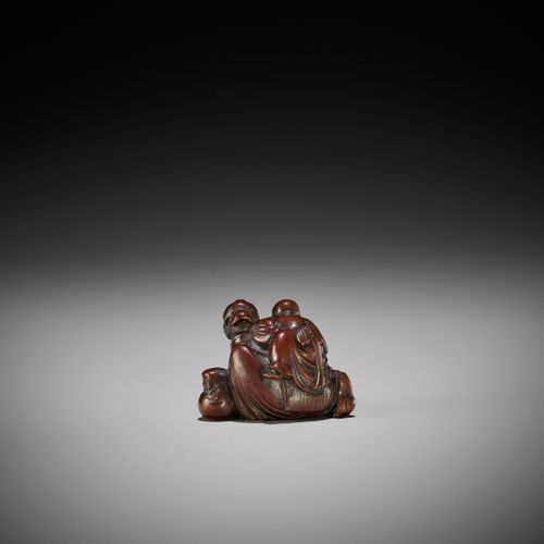 MASATOSHI: A FINE WOOD SHUNGA NETSUKE OF A WOMAN WITH TENGU MASK MASATOSHI: UN N&hellip;