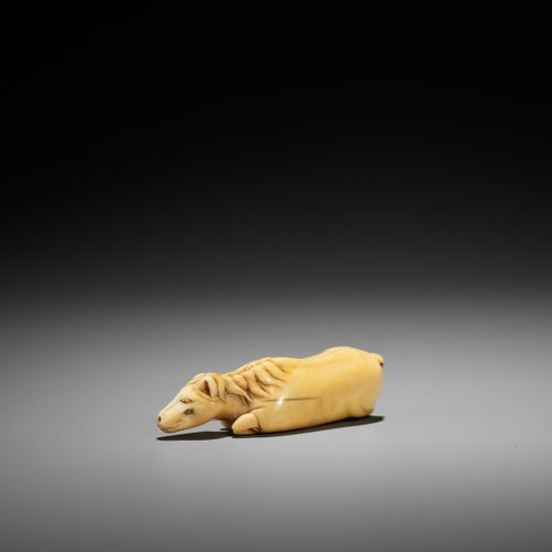 A RARE AND LARGE IVORY NETSUKE OF A COW-HORSE (USHI-UMA) A RARE AND LARGE IVORY &hellip;