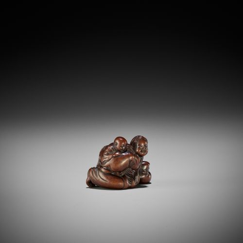 MASATOSHI: A FINE WOOD SHUNGA NETSUKE OF A WOMAN WITH TENGU MASK MASATOSHI: UN F&hellip;