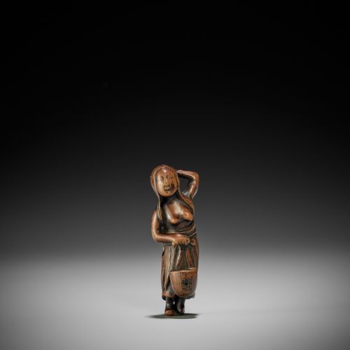 AN OLD WOOD NETSUKE OF A DIVING GIRL (AMA) AN OLD WOOD NETSUKE OF A DIVING GIRL &hellip;
