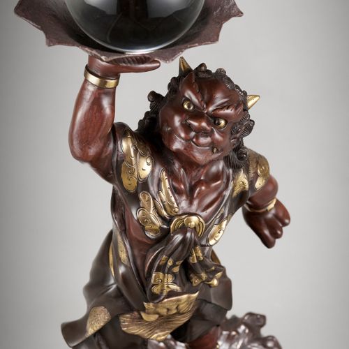 A LARGE PARCEL-GILT BRONZE MIYAO STYLE FIGURE OF AN ONI WITH ROCK CRYSTAL BALL J&hellip;
