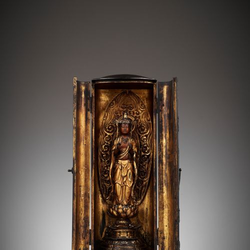 A LACQUER ZUSHI (PORTABLE BUDDHIST SHRINE) DEPICTING KANNON WITH A RETICULATED A&hellip;