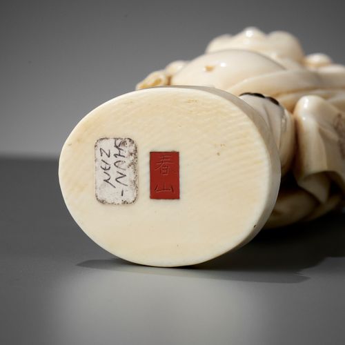 SHUNZAN: AN IVORY OKIMONO OF HOTEI WITH TWO KARAKO By Shunzan, signed Shunzan
Ja&hellip;