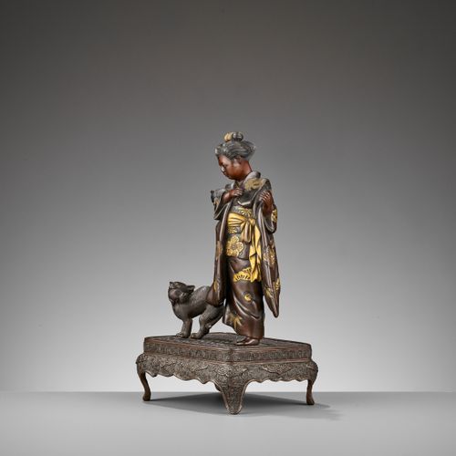 MIYAO: A RARE GOLD-INLAID BRONZE OKIMONO OF A LADY WITH CATS MIYAO:罕见的金漆铜质带猫的女士O&hellip;