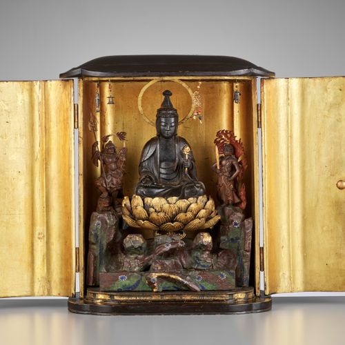 A LARGE BLACK AND GOLD LACQUERED SHRINE (ZUSHI) WITH KANNON, BISHAMONTEN AND FUD&hellip;