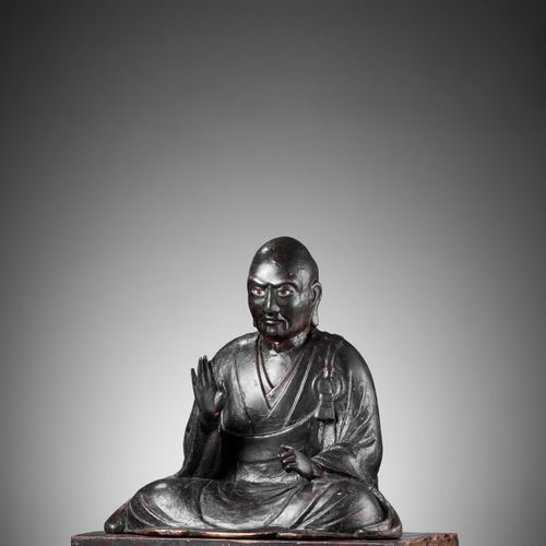 A LACQUERED WOOD FIGURE OF A SEATED BUDDHIST MONK LACQUERED WOOD FIGURE OF BUDDH&hellip;