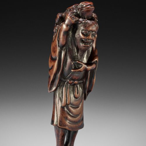 TADATOSHI: A LARGE WOOD NETSUKE OF GAMA SENNIN TADATOSHI: A LARGE WOOD NETSUKE o&hellip;