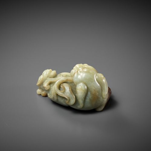 A CELADON AND RUSSET JADE 'BUDDHIST LION AND CUB' GROUP, 17TH CENTURY BUDDHISTIS&hellip;