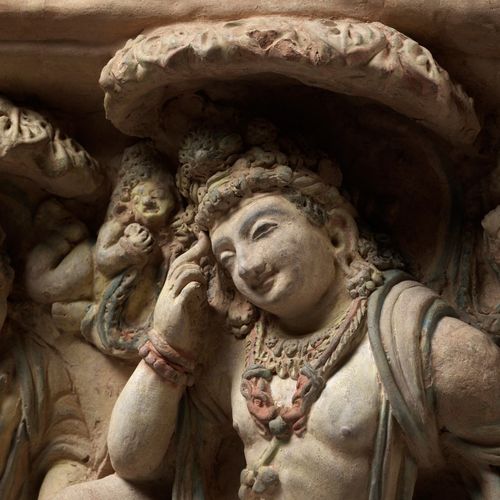 AN EXTRAORDINARILY RARE AND SPECTACULAR TERRACOTTA RELIEF OF A THINKING PRINCE S&hellip;