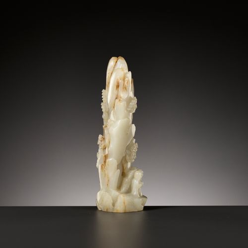 AN IMPORTANT AND RARE PALE CELADON AND RUSSET JADE MOUNTAIN, 18TH CENTURY UN'IMP&hellip;