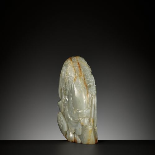 A CELADON AND RUSSET JADE 'DEER AND CRANE' BOULDER, 18TH CENTURY KELADON- UND RU&hellip;