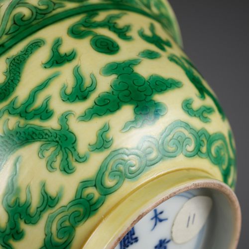 A YELLOW-GROUND GREEN-ENAMELED 'DRAGON' BOWL, KANGXI MARK AND PERIOD A YELLOW-GR&hellip;
