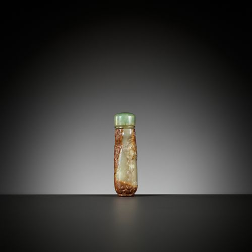 A CARVED CELADON AND RUSSET JADE SNUFF BOTTLE, MASTER OF THE ROCKS SCHOOL, 1740-&hellip;