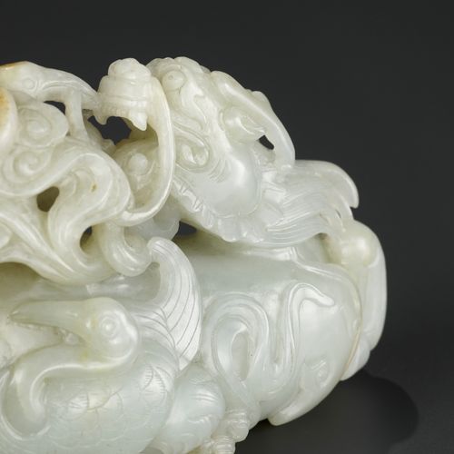 A CELADON AND RUSSET JADE 'QILIN AND CRANES' GROUP, 18TH CENTURY GRUPPO "QILIN E&hellip;