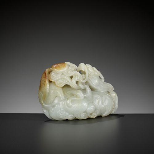 A CELADON AND RUSSET JADE 'QILIN AND CRANES' GROUP, 18TH CENTURY 瓷器和俄罗斯玉器的 "麒麟盘龙&hellip;