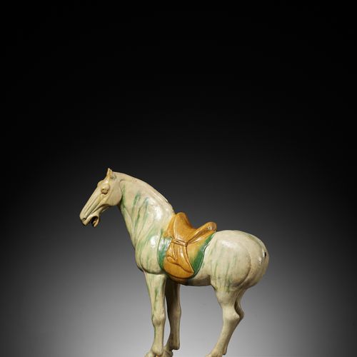 A LARGE SANCAI GLAZED POTTERY FIGURE OF A HORSE, TANG DYNASTY GRANDE FIGURE DE C&hellip;