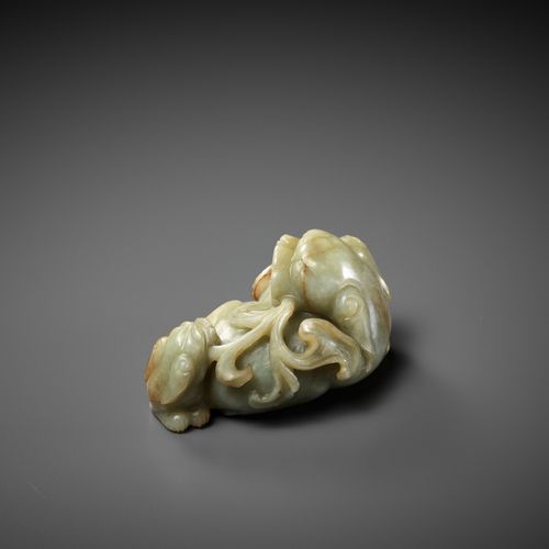 A CELADON AND RUSSET JADE 'BUDDHIST LION AND CUB' GROUP, 17TH CENTURY BUDDHISTIS&hellip;