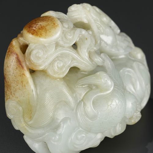 A CELADON AND RUSSET JADE 'QILIN AND CRANES' GROUP, 18TH CENTURY A CELADON AND R&hellip;