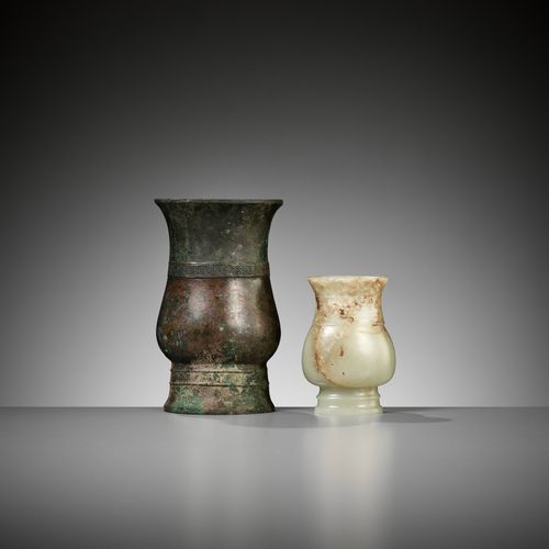 A RARE ARCHAISTIC 'SHANG BRONZE IMITATION' JADE VESSEL, ZHI, LATE SONG TO EARLY &hellip;