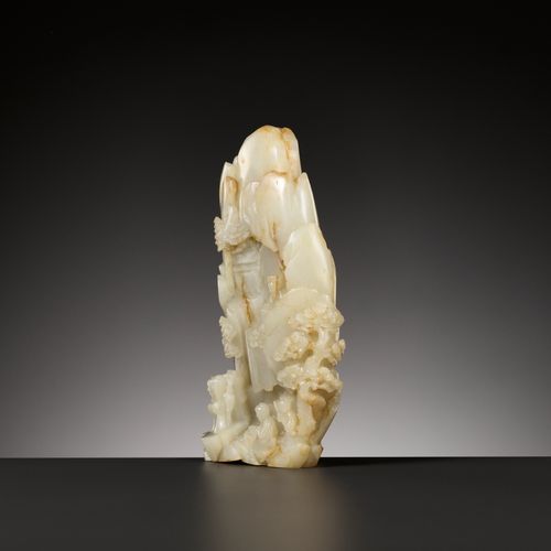 AN IMPORTANT AND RARE PALE CELADON AND RUSSET JADE MOUNTAIN, 18TH CENTURY UN'IMP&hellip;