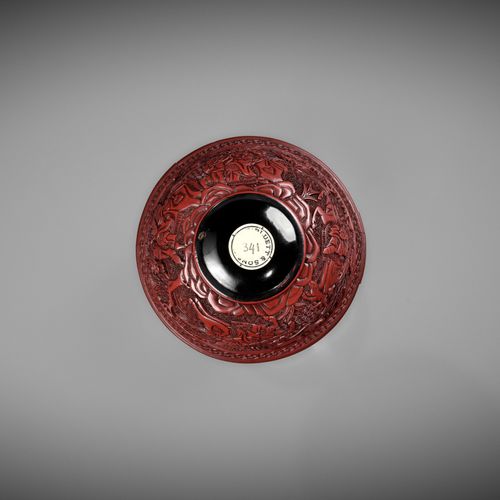 A RARE RED LACQUER 'MONGOL HUNT' BOWL, ATTRIBUTED TO ZHOU ZHU A RARE RED LACQUER&hellip;