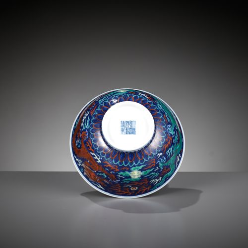 A RARE BLUE-GROUND POLYCHROME-DECORATED ‘DRAGON’ BOWL, QIANLONG MARK AND PERIOD &hellip;