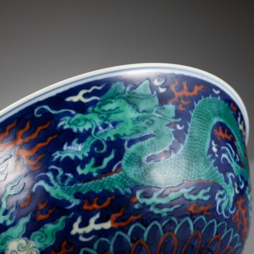 A RARE BLUE-GROUND POLYCHROME-DECORATED ‘DRAGON’ BOWL, QIANLONG MARK AND PERIOD &hellip;