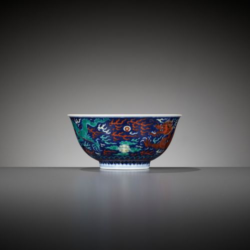 A RARE BLUE-GROUND POLYCHROME-DECORATED ‘DRAGON’ BOWL, QIANLONG MARK AND PERIOD &hellip;
