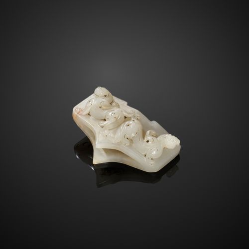 A 4-PART WHITE AND RUSSET JADE SWORD FITTING, WESTERN HAN A 4-PART WHITE AND RUS&hellip;