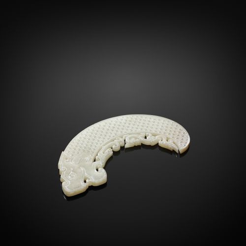 A WHITE JADE ‘DRAGON’ ORNAMENT, WESTERN HAN 西汉白玉 "龙 "形摆件

玉器。中国，西汉早期，徐州类型，公元前2世纪&hellip;