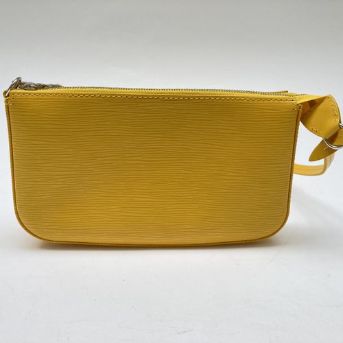 LOUIS VUITTON 
Lexington" clutch bag in yellow epi leather, zipper, short handle&hellip;