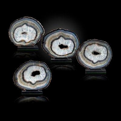 Null Sealed Bid Auction
Minerals: A set of four graduated Agate slices on stands&hellip;