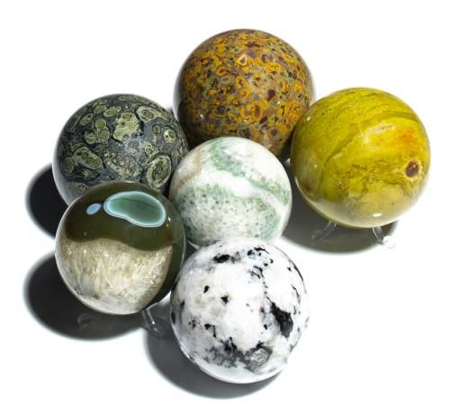 Null A collection of six semi precious stone spheres to include fruit jasper, mo&hellip;