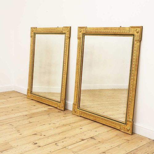 Null Paire de miroirs en bois doré et ébène, de fabrication récente, chacun de f&hellip;