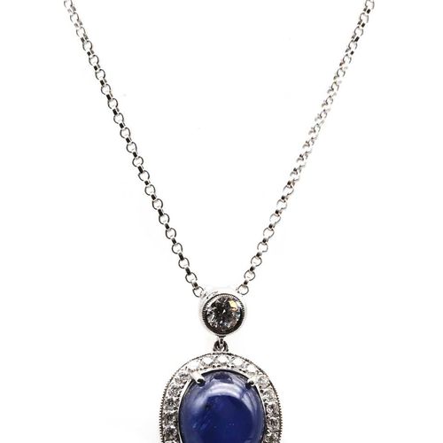 An 18ct white gold star sapphire and diamond pendant, 18K白金星形蓝宝石和钻石吊坠，18K白金星形蓝宝石&hellip;